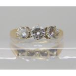 A 9ct gold three stone diamond ring, set with estimated approx 0.65cts of brilliant cut diamonds