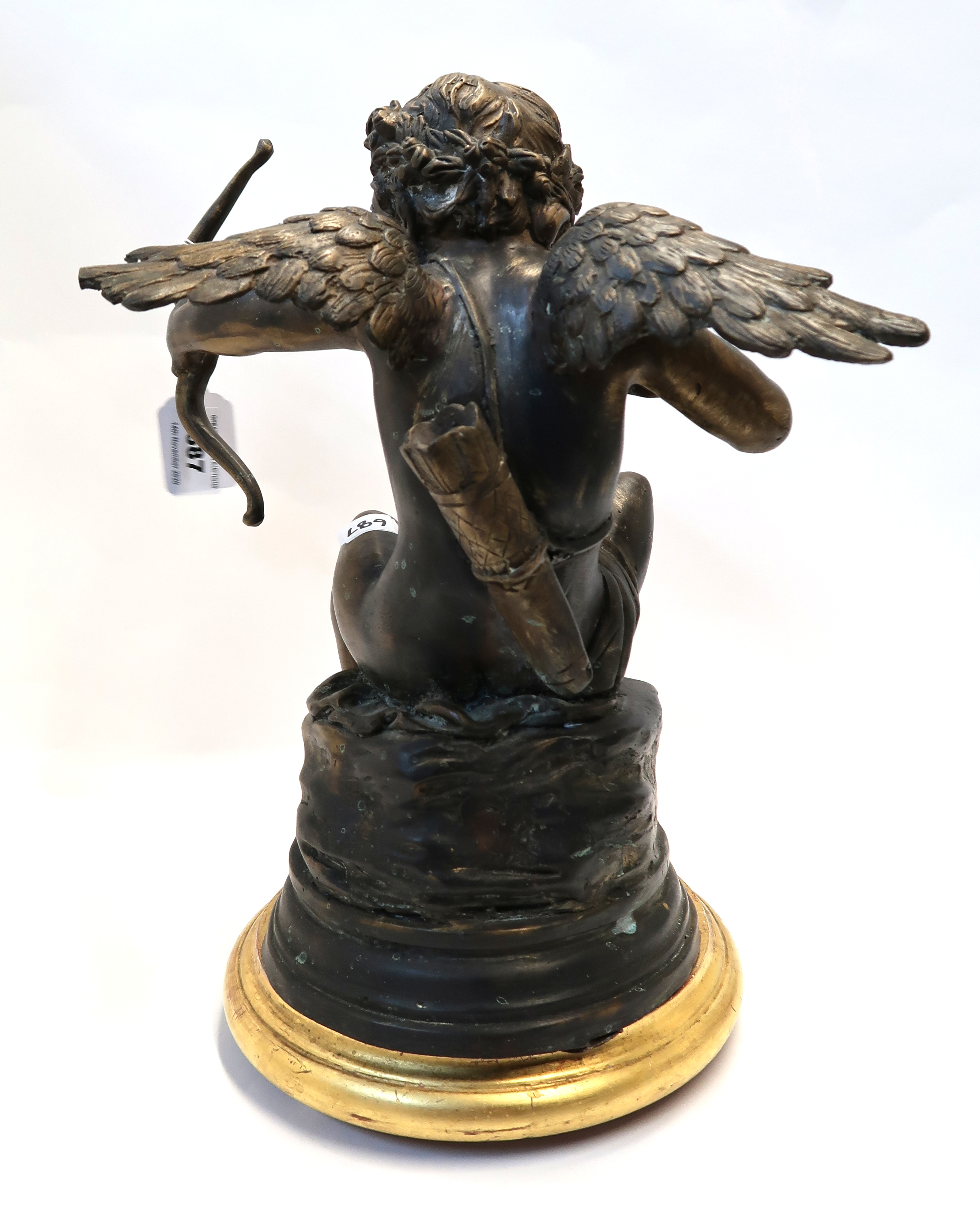 A bronze of a cherub, upon gilt plinth, 35cm high Condition Report: Available upon request - Bild 3 aus 3