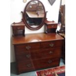 A mahogany dressing chest with oval mirror, 155cm high x 107cm wide x 50cm deep Condition Report: