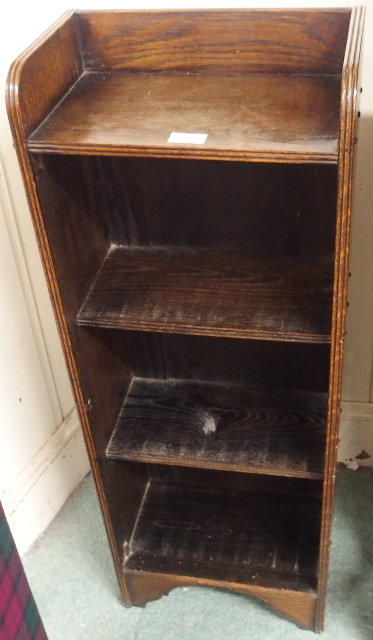 A narrow open oak bookcase, 100cm high x 36cm wide Condition Report: Available upon request