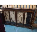 A mahogany bookcase with four astragal glazed doors, 121cm high x 184cm wide Condition Report: