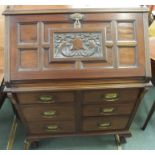 A mahogany bureau with carved lid and six drawers, 114cm high x 80cm wide Condition Report: