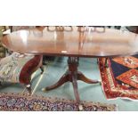 A mahogany oval dining/coffee table, 74cm high x 155cm wide x 86cm deep Condition Report: