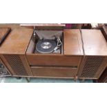 A teak stereogram with Garrard 2000 turntable and Murphy radio Condition Report: Available upon