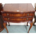 A reproduction mahogany two drawer table, 80cm high x 72cm wide Condition Report: Available upon