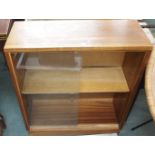 A teak cabinet with sliding glass doors and two occasional tables (3) Condition Report: Available