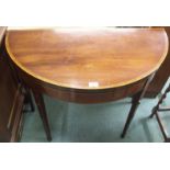 A mahogany fold over card table Condition Report: Available upon request