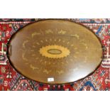 A floral inlaid tray with brass handles Condition Report: Available upon request