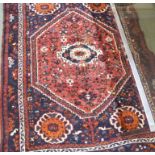 A blue ground Eastern rug, 150cm x 111cm and a floor lamp (2) Condition Report: Available upon