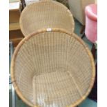 A pair of mid-Century cane/wicker satellite chairs (2) Condition Report: Available upon request