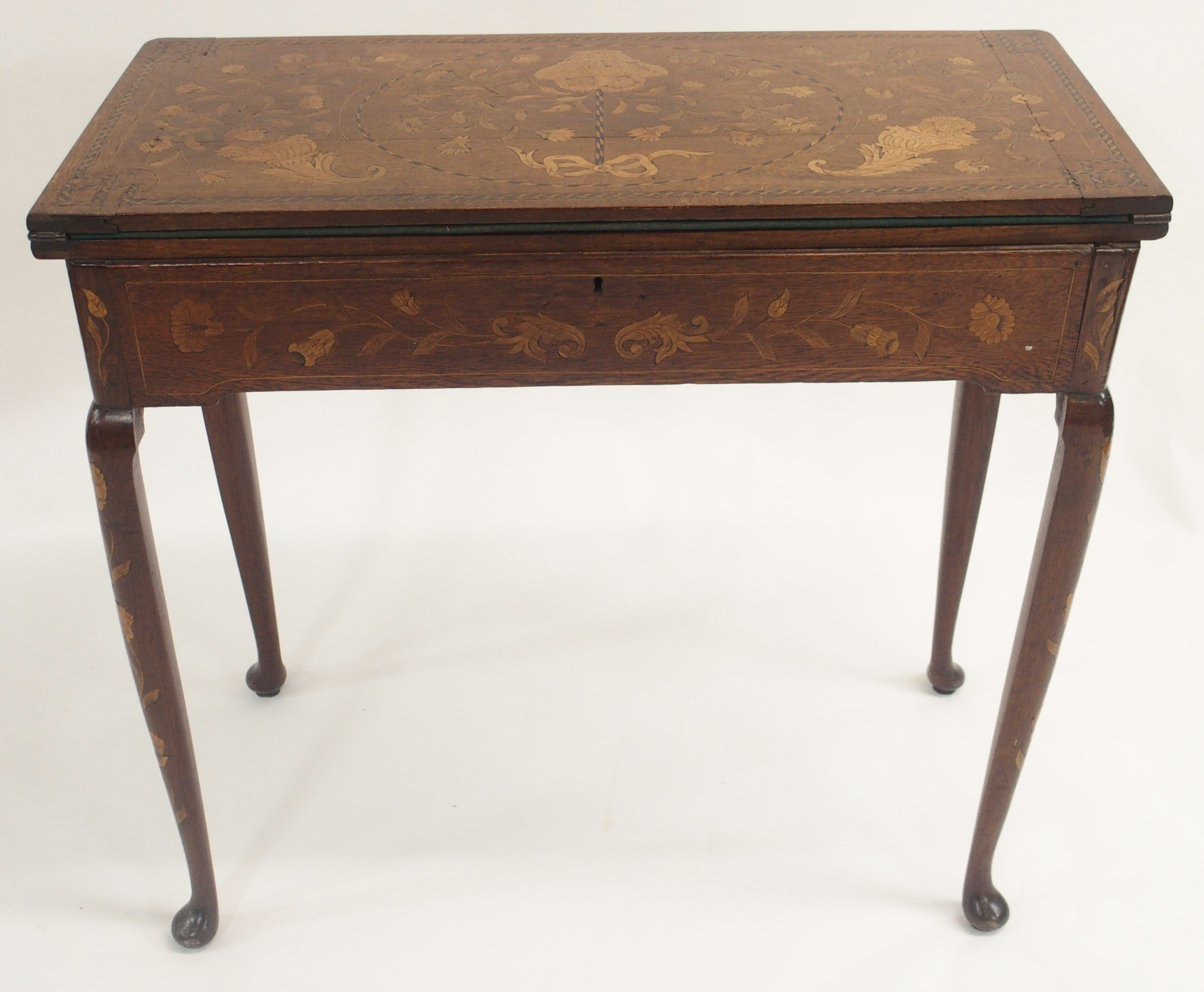 A DUTCH MARQUETRY OAK FOLD OVER CARD TABLE decorated with a basket of ribbon tied flowers, - Image 6 of 10