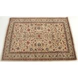 A CREAM GROUND FINE KESHAN with allover floral design, 190cm x 135cm Condition Report: Available