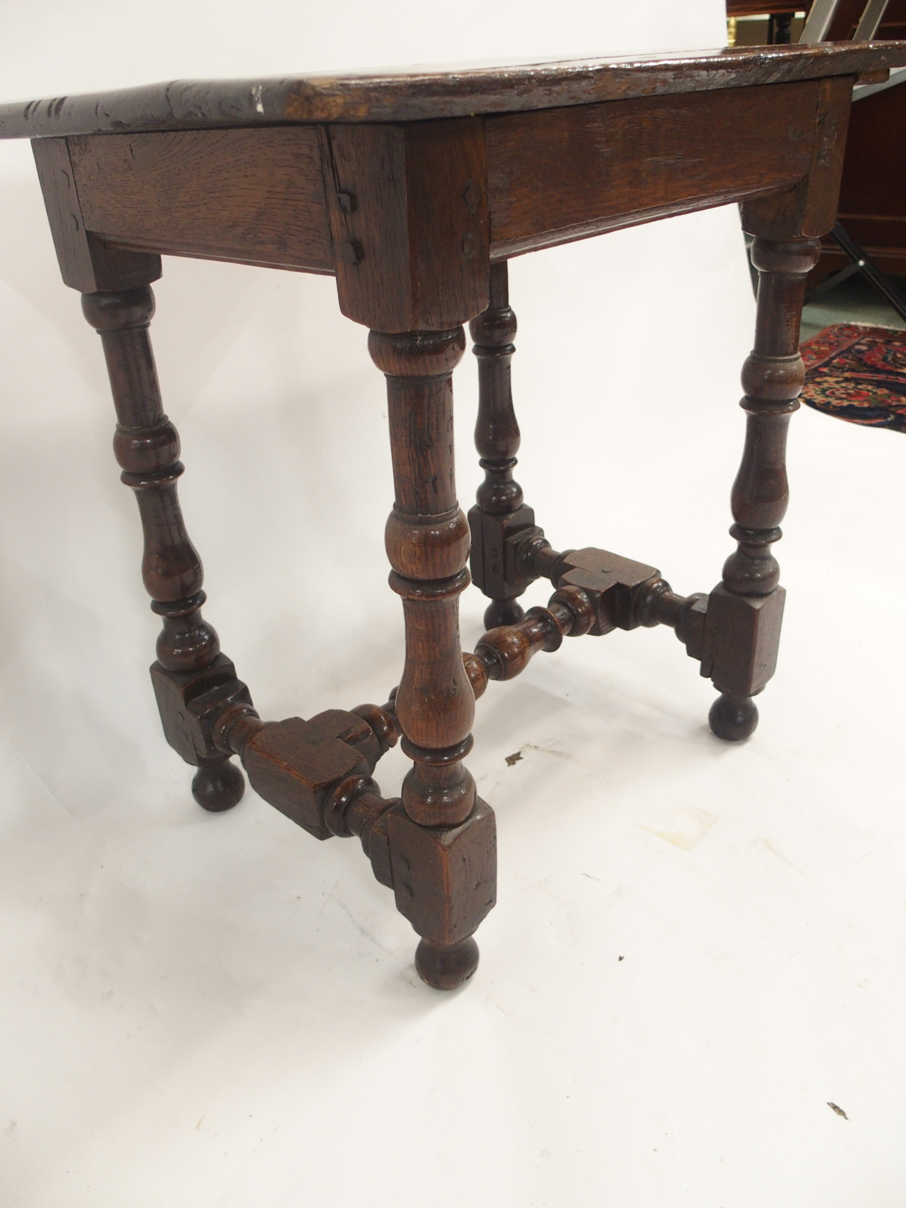 AN 18TH CENTURY AND LATER OAK JOINT STOOL the broad seat on ring turned baluster legs, joined by - Image 4 of 10