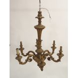 THREE GILTWOOD CHANDELIERS with six scroll candle branches, joined by acanthus leaf columns, 84cm