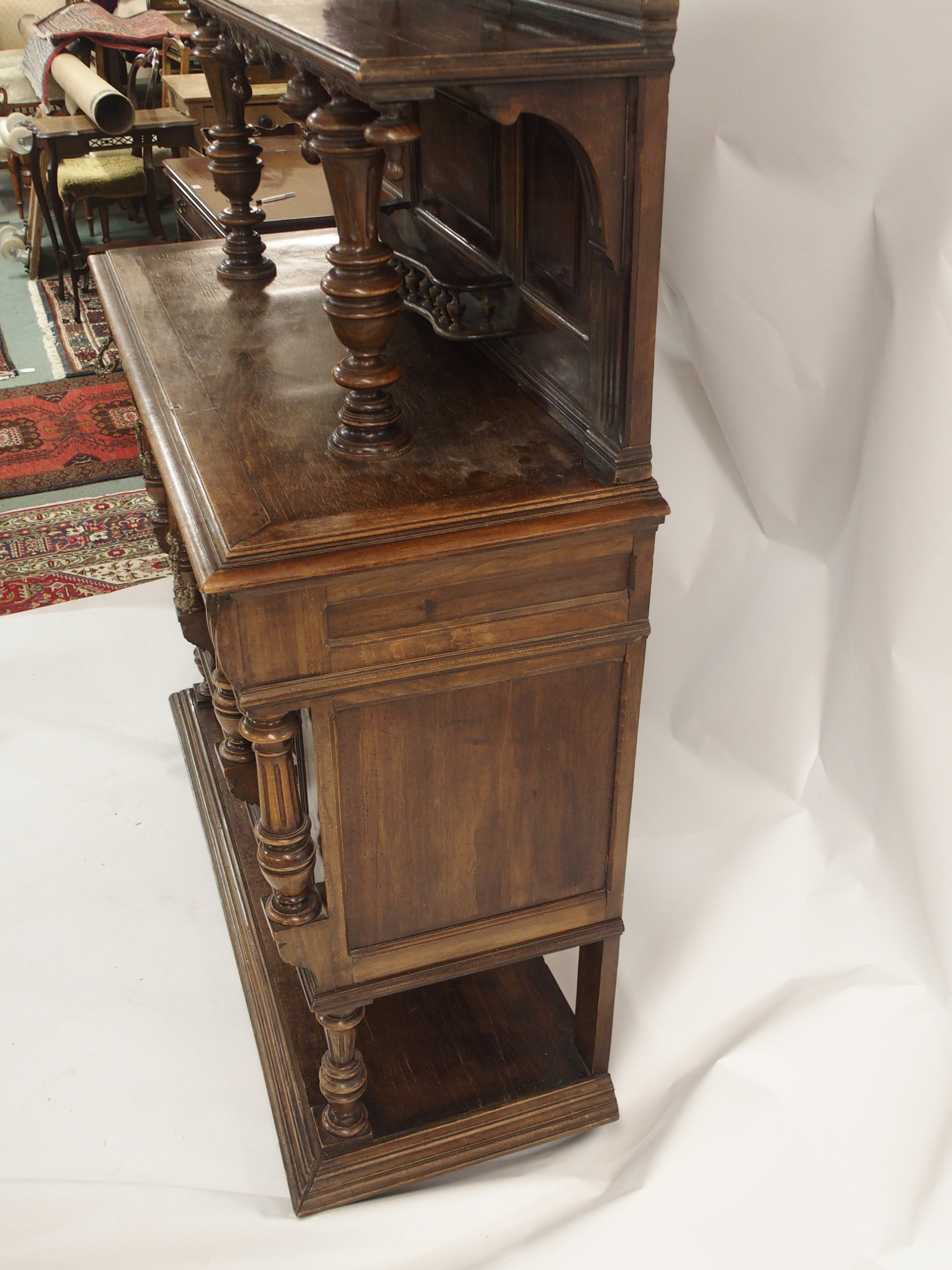 A CONTINENTAL WALNUT SIDEBOARD the back with broad shelf on fluted supports,above a gallery and - Image 33 of 33