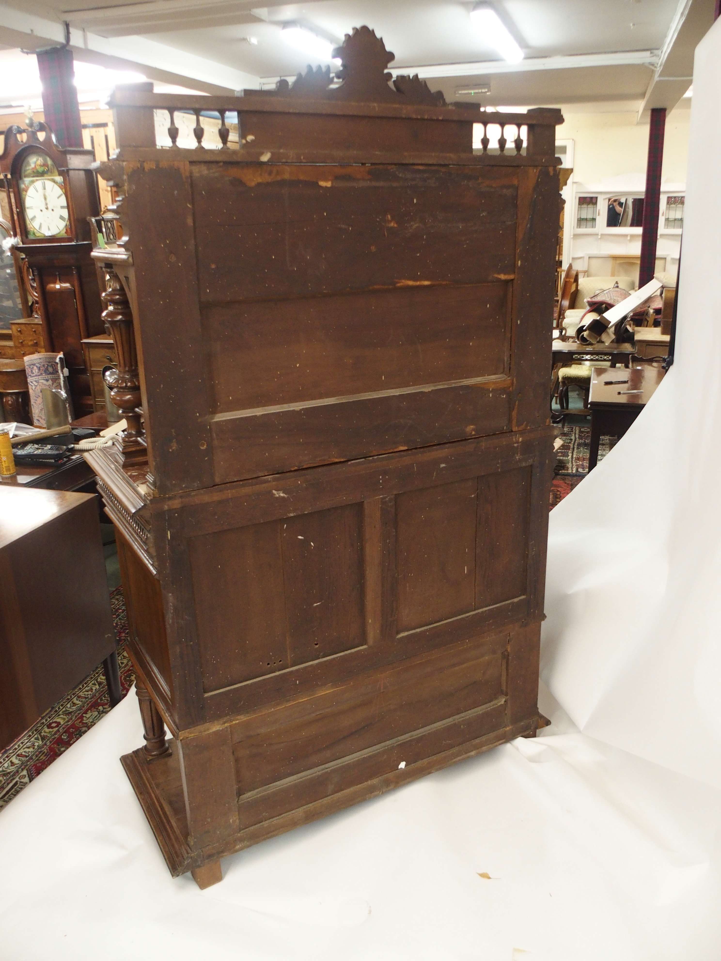 A CONTINENTAL WALNUT SIDEBOARD the back with broad shelf on fluted supports,above a gallery and - Image 18 of 33