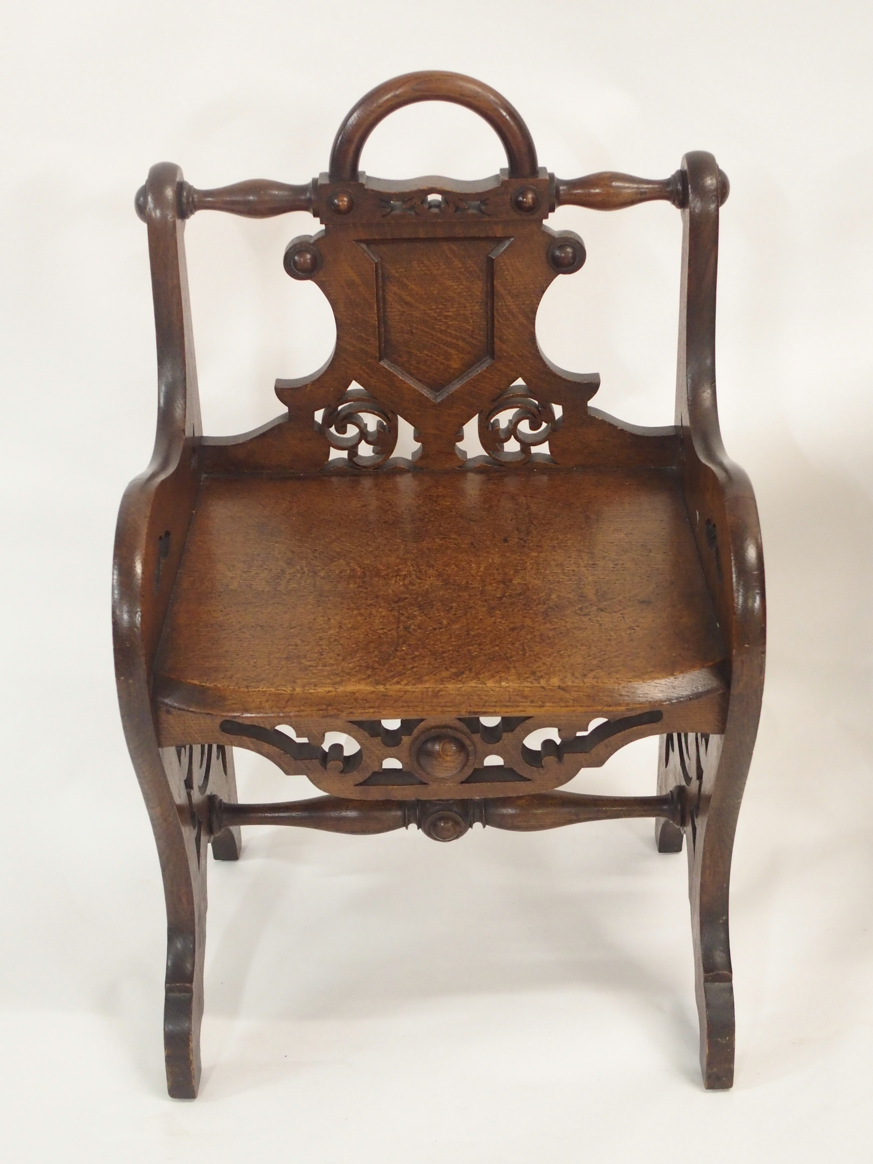 A PAIR OF VICTORIAN OAK HALL CHAIRS each carved with a shield back and pierced scrolls with loop - Image 3 of 12