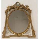 A LOUIS XVI STYLE GILTWOOD AND GESSO WALL MIRROR with Sevres pattern oval plaque of Marie Antoinette