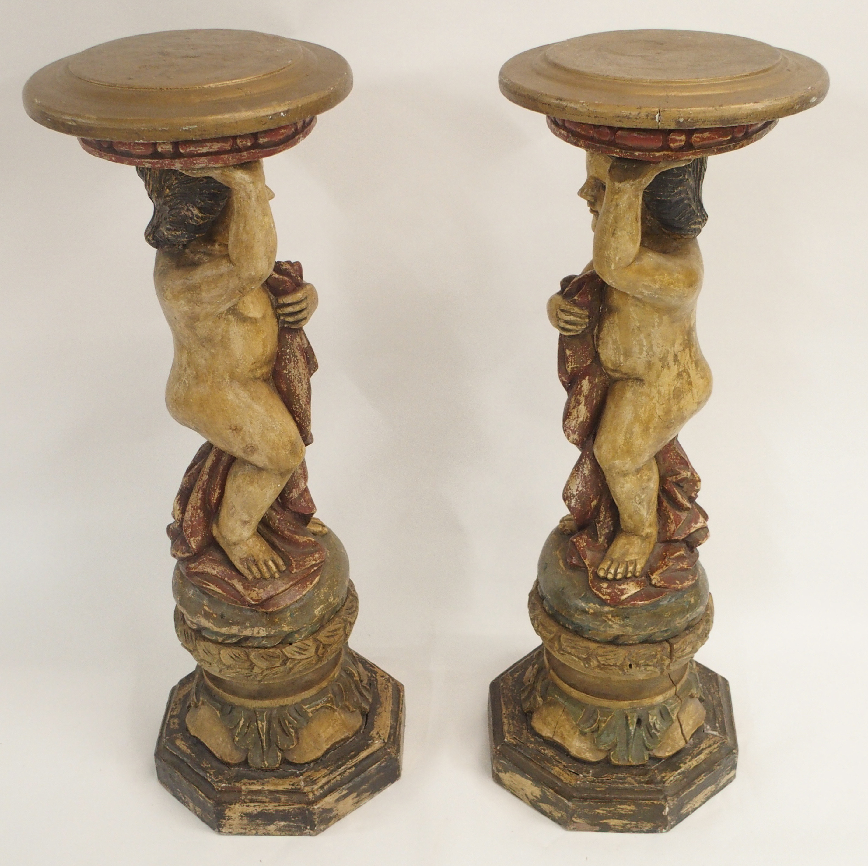 A PAIR OF CONTINENTAL POLYCHROME PINE PEDESTALS each carved with putti holding a robe and standing - Image 14 of 15