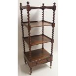 A VICTORIAN ROSEWOOD FOUR TIER WHAT NOT with spiral columns, joined to open shelves and above a