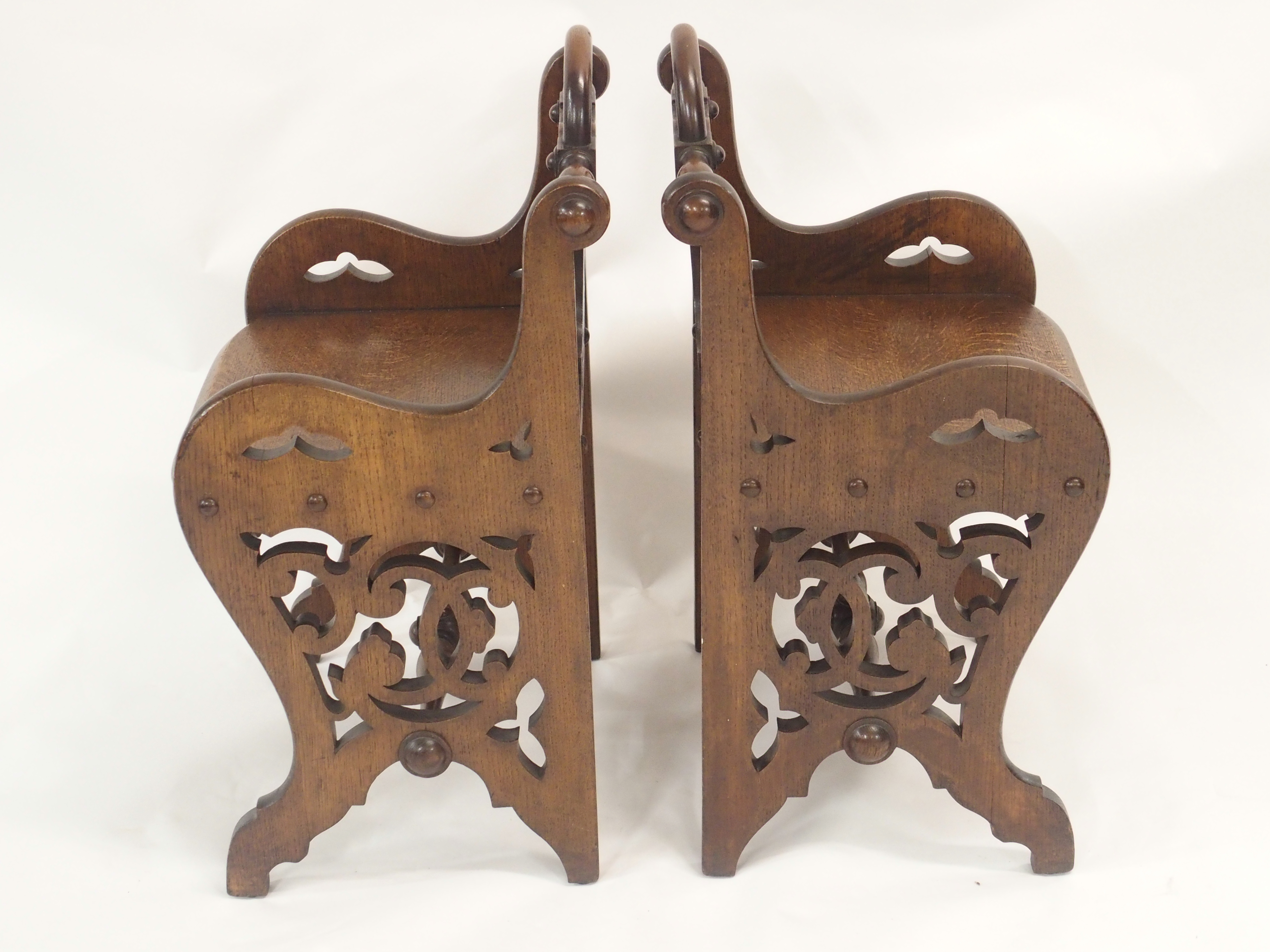 A PAIR OF VICTORIAN OAK HALL CHAIRS each carved with a shield back and pierced scrolls with loop - Image 11 of 12