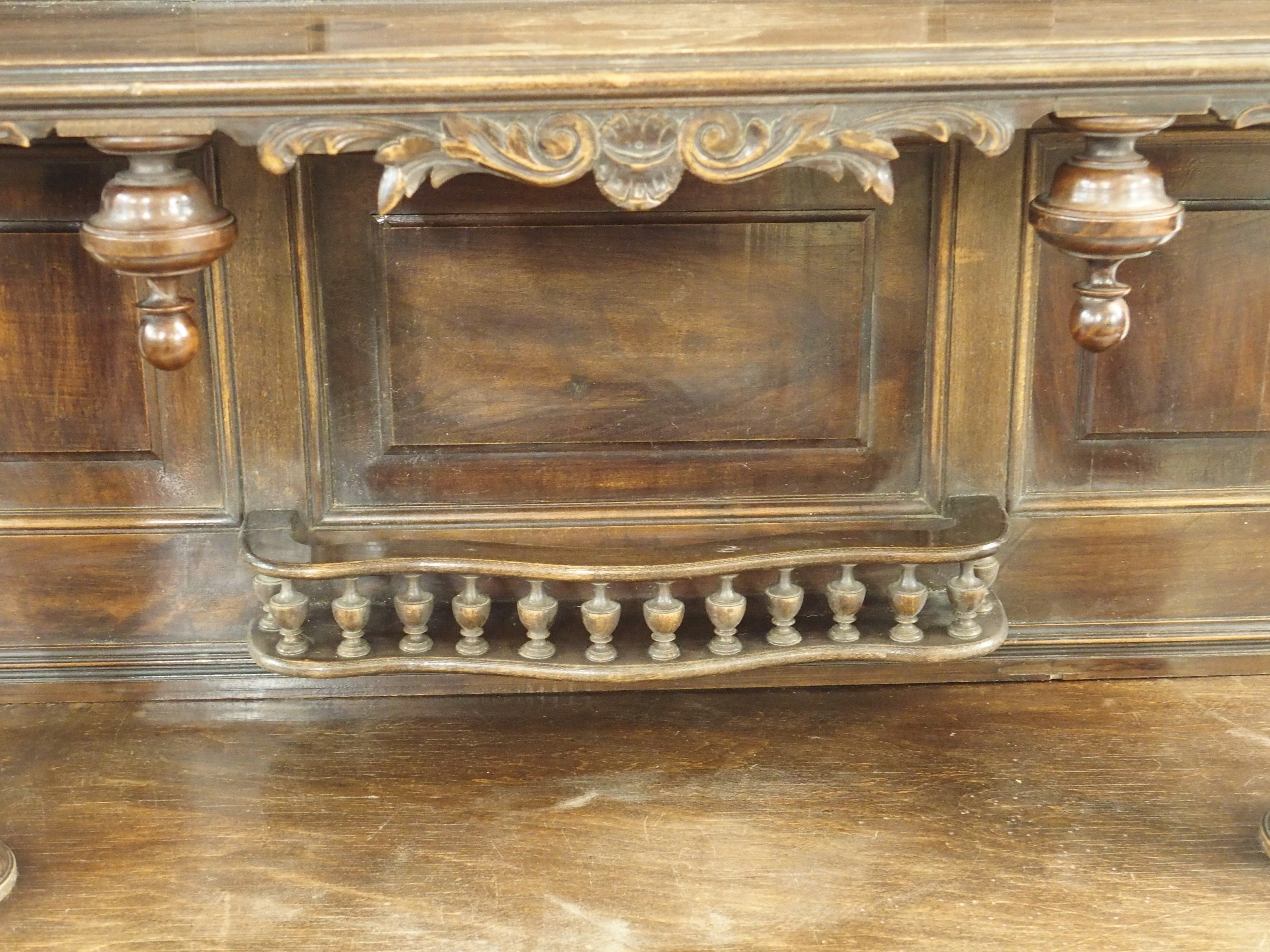 A CONTINENTAL WALNUT SIDEBOARD the back with broad shelf on fluted supports,above a gallery and - Image 25 of 33