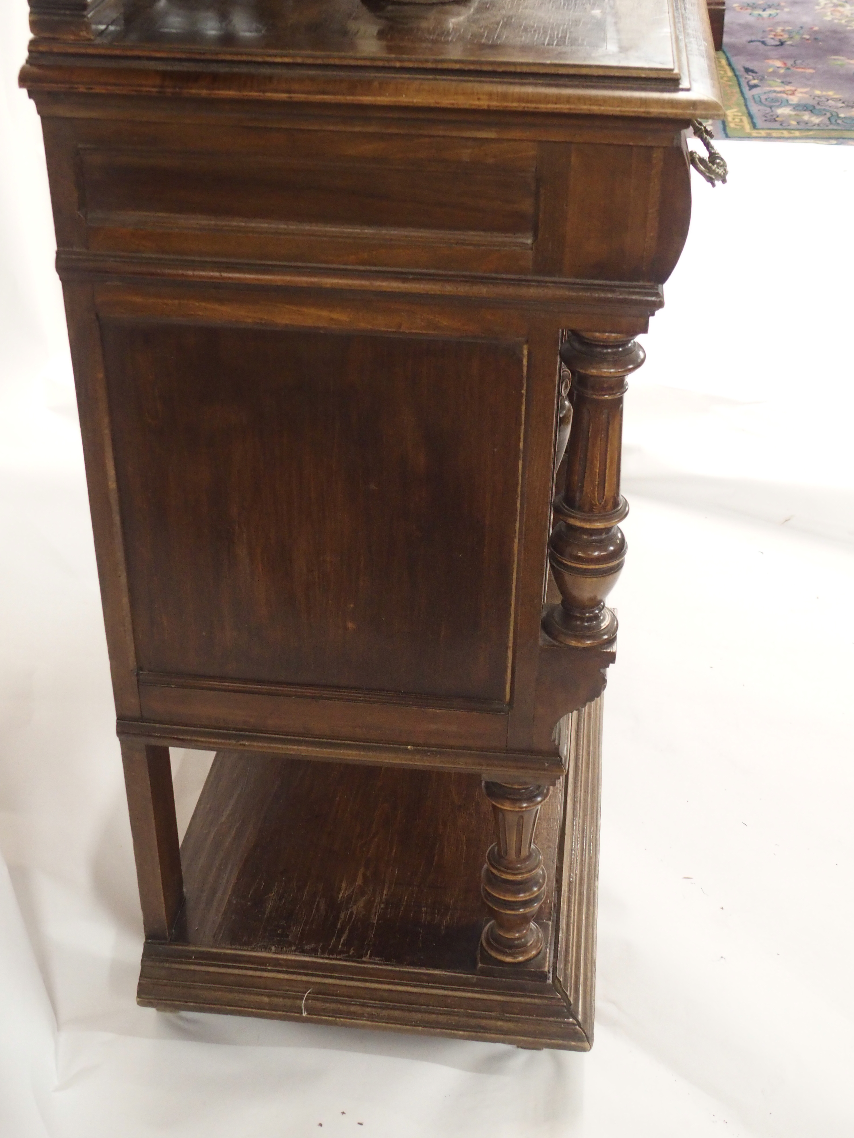 A CONTINENTAL WALNUT SIDEBOARD the back with broad shelf on fluted supports,above a gallery and - Image 30 of 33