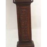 A 19TH CENTURY OAK LONGCASE CLOCK the silvered dial inscribed to Wm Wilks, Wolverton, Roman