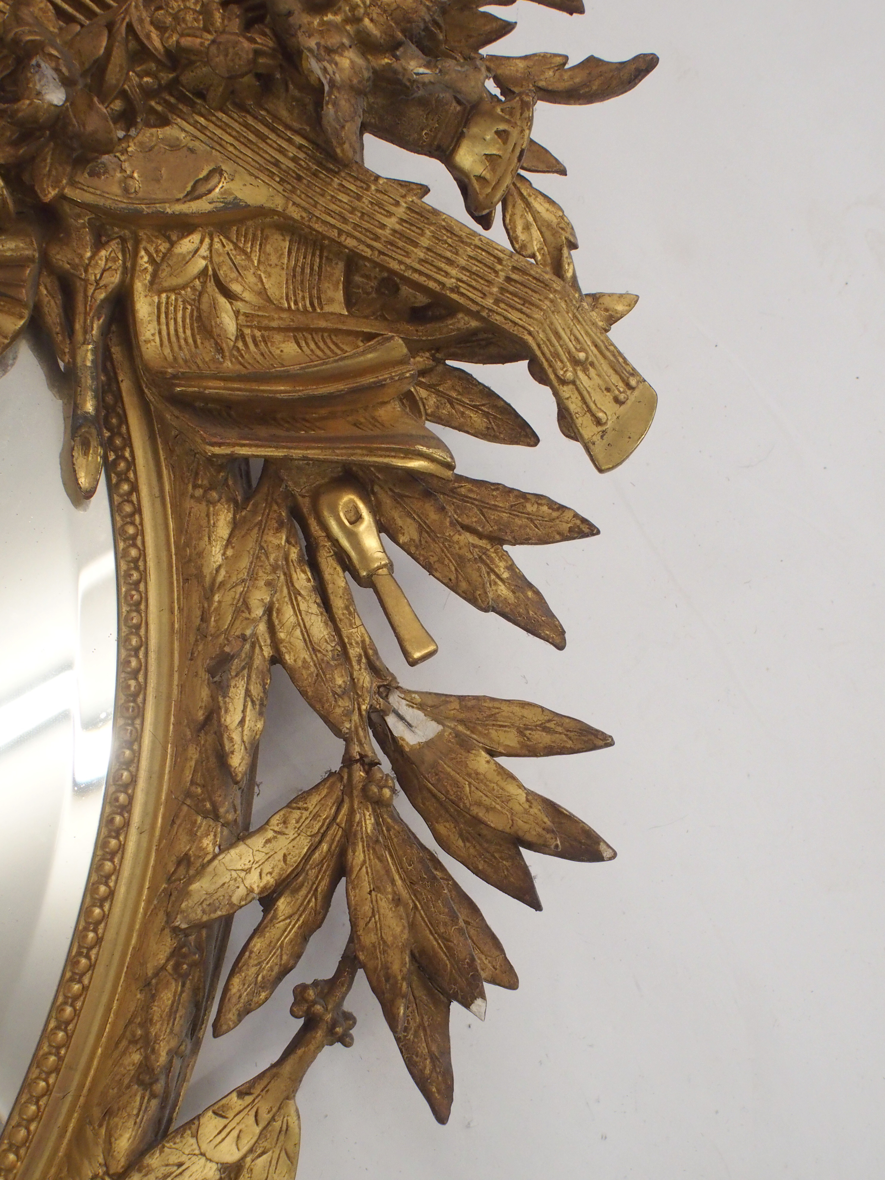 A LOUIS XVI STYLE GILTWOOD AND GESSO OVAL WALL MIRROR with birds and musical trophy surmount above - Image 6 of 12