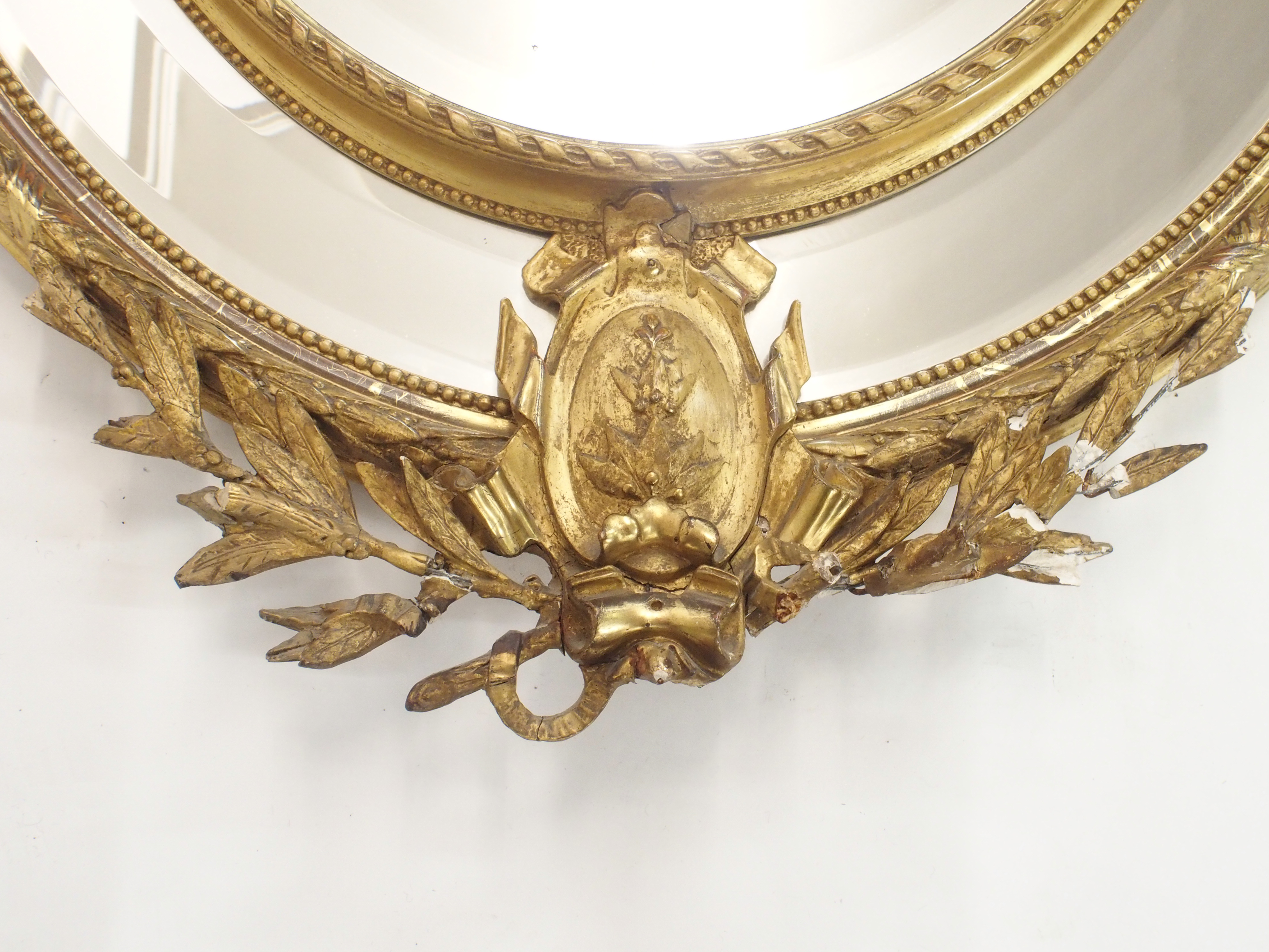 A LOUIS XVI STYLE GILTWOOD AND GESSO OVAL WALL MIRROR with birds and musical trophy surmount above - Image 9 of 12