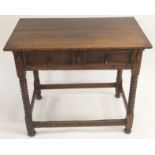 AN ENGLISH 17TH CENTURY FRUITWOOD SIDE TABLE the plain top above a single drawer with two panels