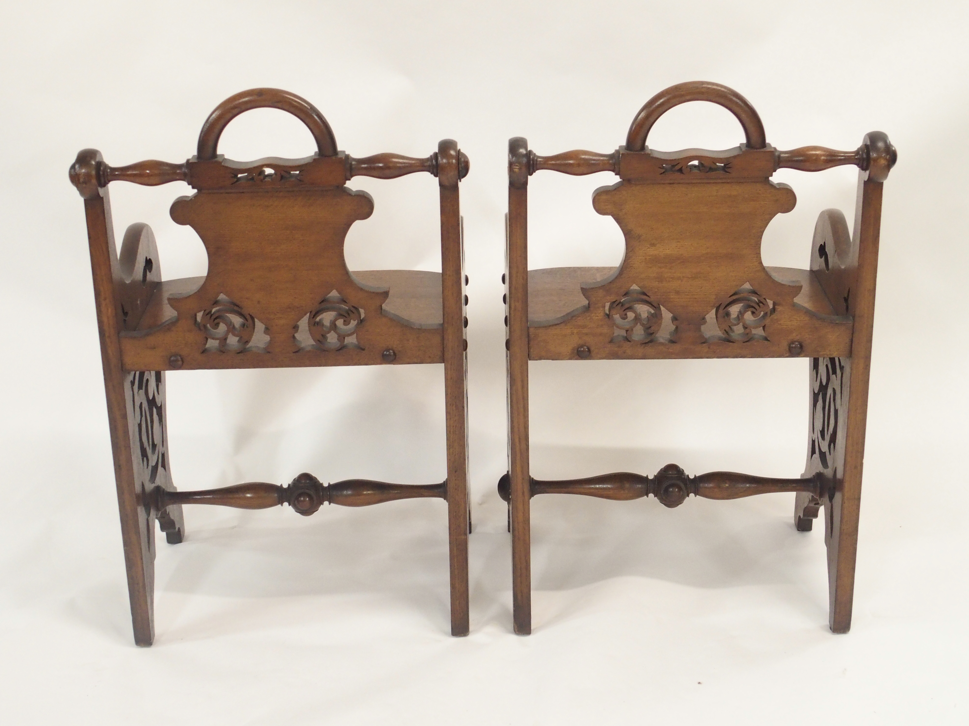 A PAIR OF VICTORIAN OAK HALL CHAIRS each carved with a shield back and pierced scrolls with loop - Image 8 of 12