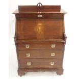 A GLASGOW STYLE WYLIE LOCHHEAD WRITING DESK probably designed by Ernest Archibald Taylor, with