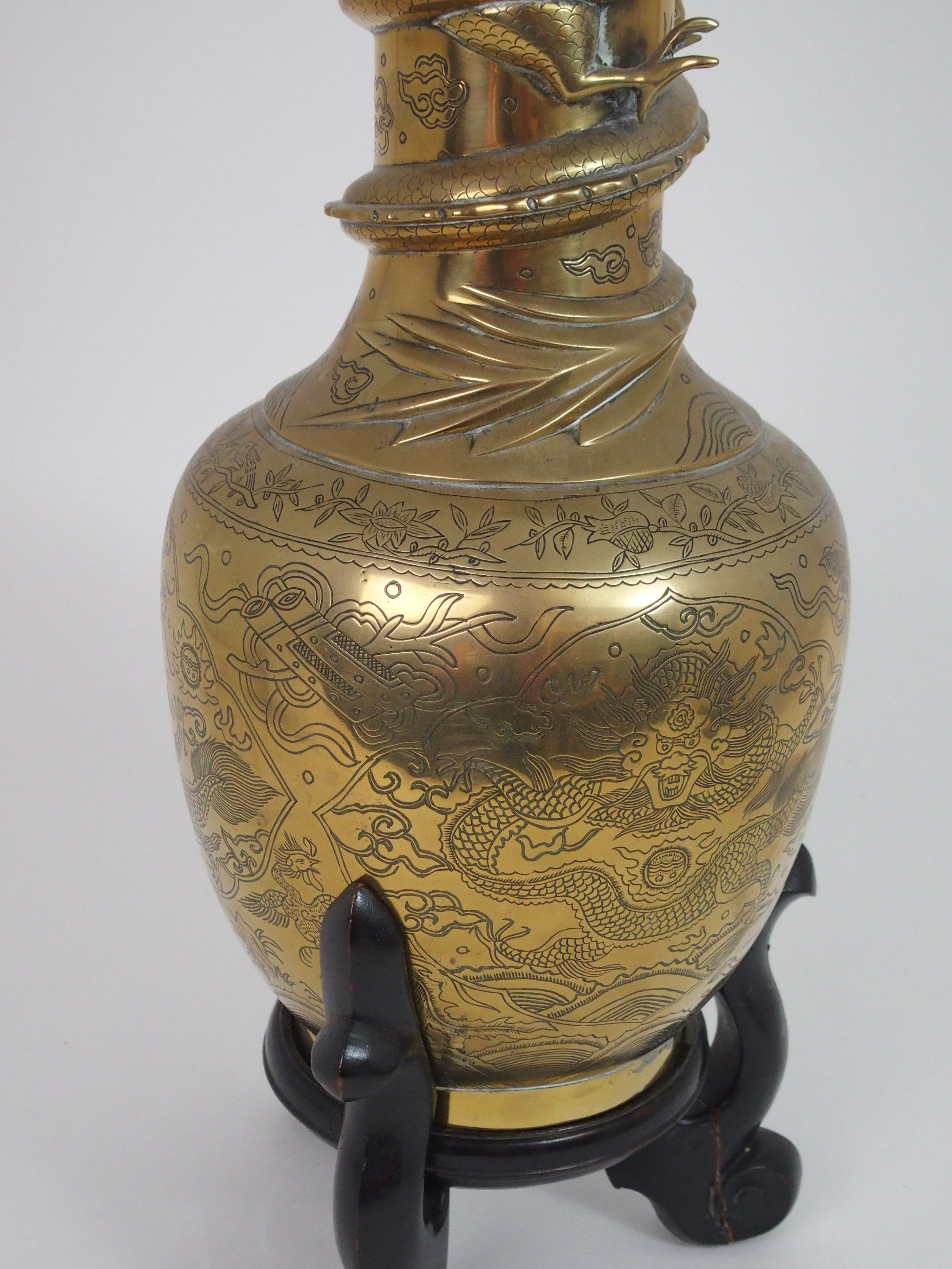 A CHINESE BRASS BALUSTER VASE cast with a dtragon wraped around the neck and above panels of dragons - Image 3 of 8