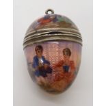 A GUILLOCHE ENAMEL EGG SHAPED VINAIGRETTE PENDANT made in white metal with continental marks, the