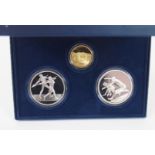 A CASED 2004 ATHENS OLYMPIC - SERIES B COINS comprising one gold and two silver coins, depicting