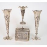 A PAIR OF CHINESE SILVER SPILL VASES decorated with prunus, beneath a wavy rim, stamped marks, 164