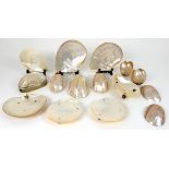 A COLLECTION OF MOTHER OF PEARL DISHES some with ball feet, candle shields, etc Condition Report: