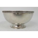 EDWARD SPENCER (1872 - 1938) FOR THE ARTIFICERS GUILD, LONDON an Arts and Crafts hammered silver