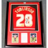 A RED AND WHITE REPLICA DONCASTER ROVERS SHIRT No.28, the reverse lettered Tomlinson, also