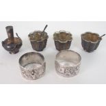 THREE CHINESE SILVER SALT CELLARS cast with figures, fish, bamboo, Shou characters and blossom,