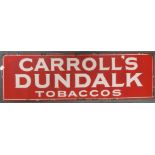AN ENAMEL CARROLL'S DUNDALK TOBACCO ADVERTISING SIGN 46 x 154cm Condition Report: surface