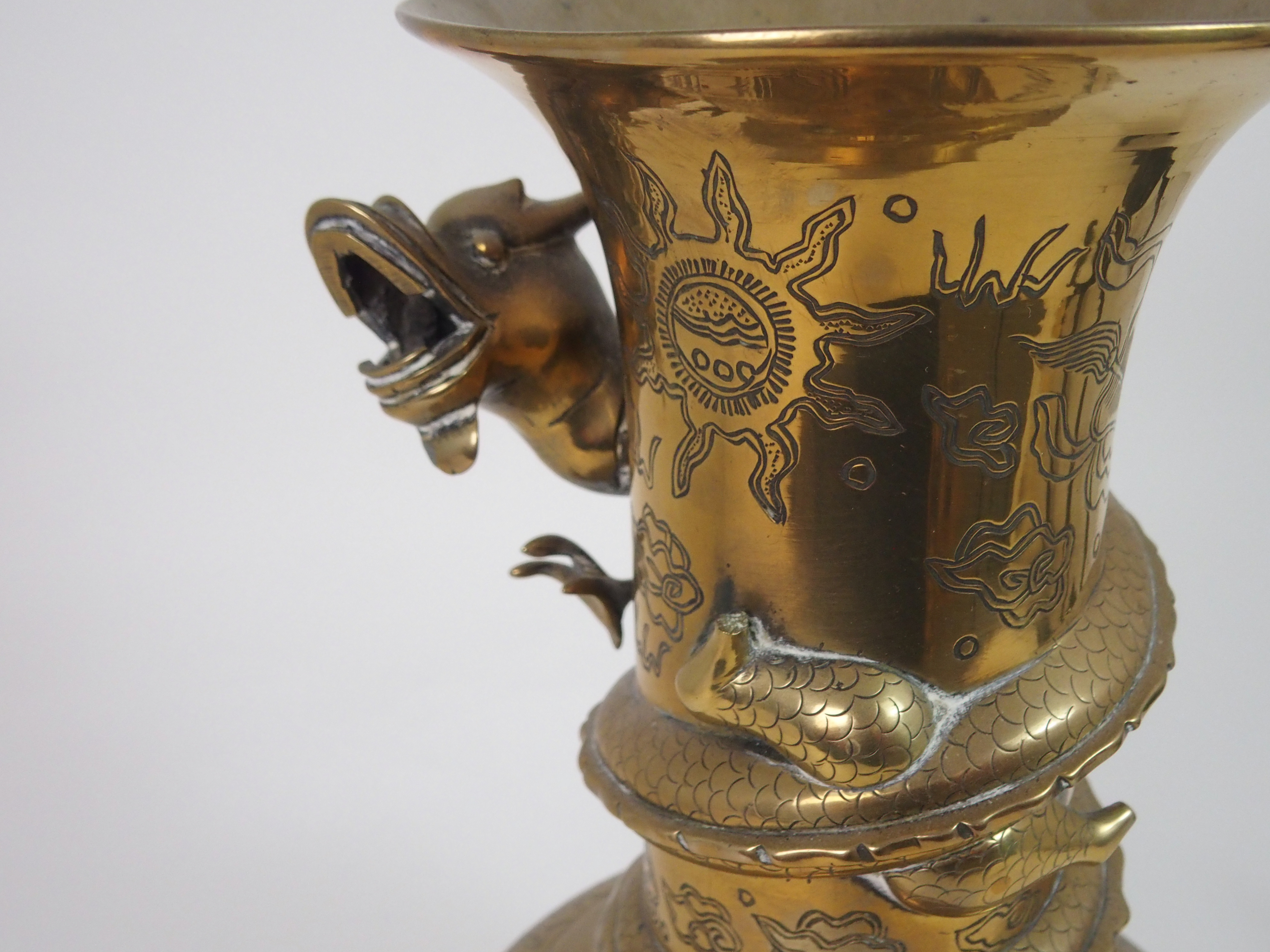 A CHINESE BRASS BALUSTER VASE cast with a dtragon wraped around the neck and above panels of dragons - Image 7 of 8