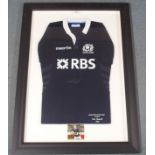 A BLUE SCOTLAND INTERNATIONAL RUGBY SHIRT with embroidered badge, England v. Scotland, 14/03/15,