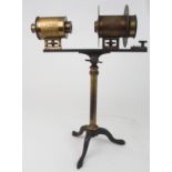 A VINTAGE FRENCH BRASS PROJECTING MICROSCOPE stamped, J Duboscq a Paris on tripos stand, 31cm wide x
