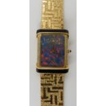 AN 18CT GOLD OPAL, DIAMOND AND ONYX LADIES PIAGET WRISTWATCH the fiery opal dial, has a gold