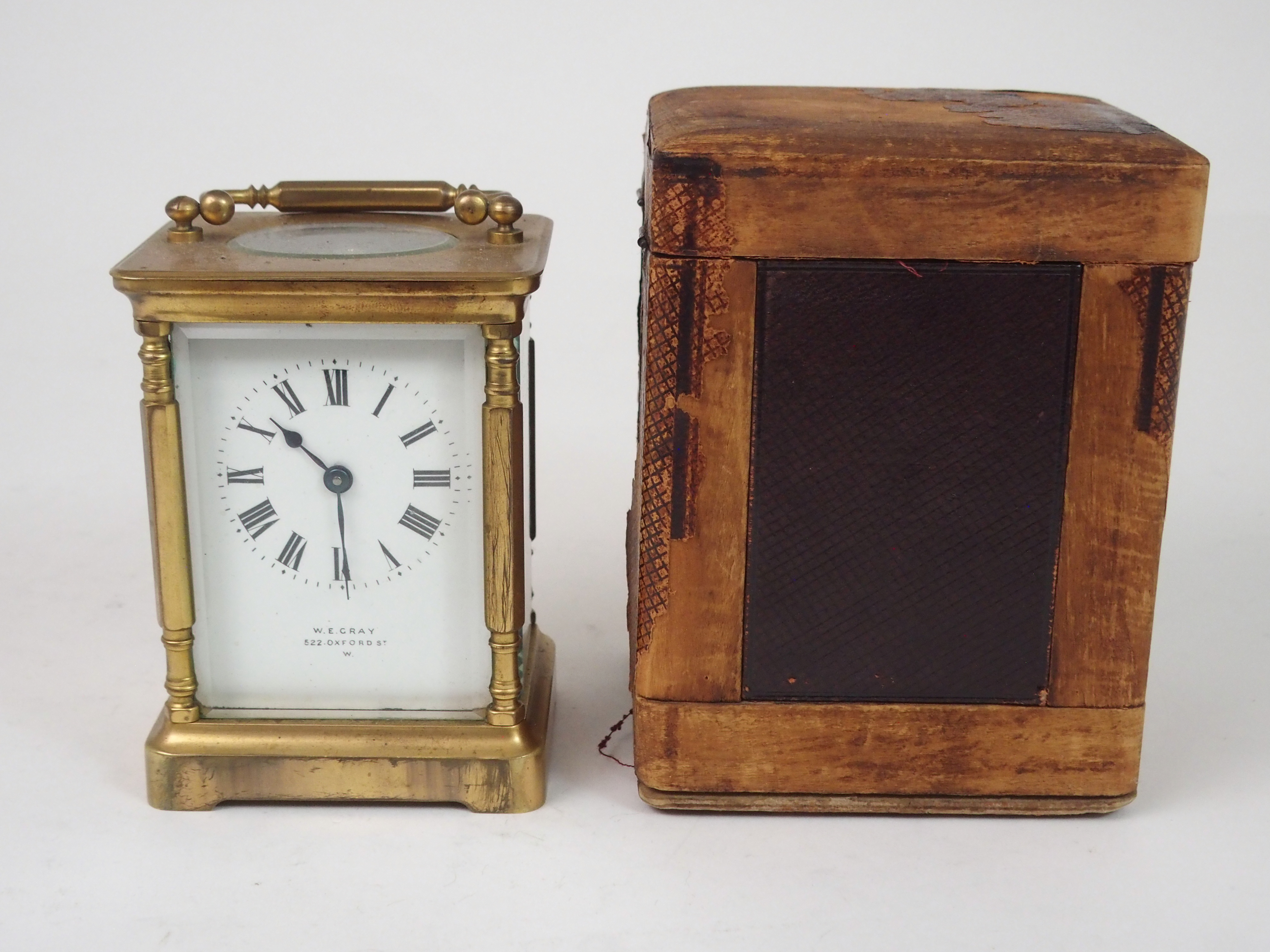 A FRENCH BRASS AND GLASS CARRIAGE CLOCK the white enamel dial with Roman Numerals, retailed by W. - Image 5 of 8