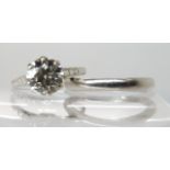 A PLATINUM DIAMOND SOLITAIRE RING WITH MATCHING WEDDING BAND the diamond is estimated approx 1.