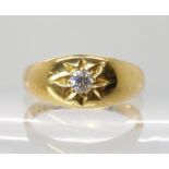 AN 18CT GOLD DIAMOND SET GYPSY RING set with an estimated approx 0.12cts old cut diamond in star