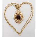 A 9CT GOLD GARNET AND PEARL PENDANT BY CROPP & FARR LTD hallmarked Birmingham 1994, length of